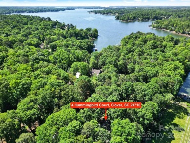Located in the gated golf community of River Hills on Lake Wylie on River Hills Country Club in South Carolina - for sale on GolfHomes.com, golf home, golf lot