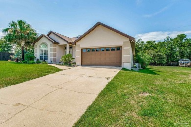 Nestled in a peaceful cul-de-sac, this stunning 4-bedroom, 2 on Tiger Point Golf and Country Club in Florida - for sale on GolfHomes.com, golf home, golf lot