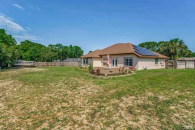 Nestled in a peaceful cul-de-sac, this stunning 4-bedroom, 2 on Tiger Point Golf and Country Club in Florida - for sale on GolfHomes.com, golf home, golf lot