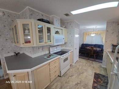 READY FOR A 2ND HOME IN FLORIDA? TAKE A LOOK AT THIS 2 BEDROOM on Southport Springs Golf Club in Florida - for sale on GolfHomes.com, golf home, golf lot