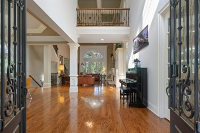 Welcome to this exceptional 3-sided brick and stone executive on Hamilton Mill Golf Club in Georgia - for sale on GolfHomes.com, golf home, golf lot