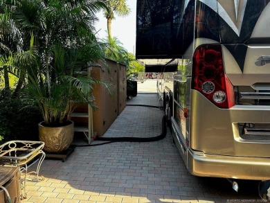 Discover the perfect combination of privacy, space, and luxury on Motorcoach Resort Golf Course in Florida - for sale on GolfHomes.com, golf home, golf lot