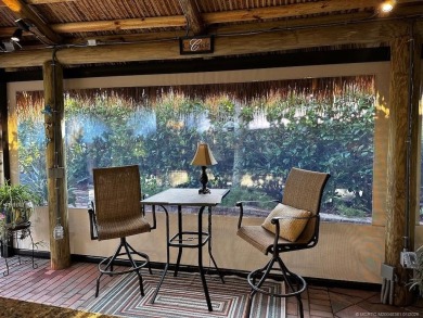 Discover the perfect combination of privacy, space, and luxury on Motorcoach Resort Golf Course in Florida - for sale on GolfHomes.com, golf home, golf lot