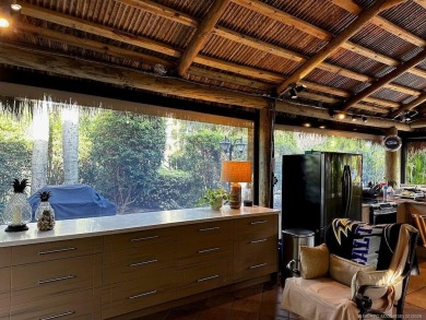 Discover the perfect combination of privacy, space, and luxury on Motorcoach Resort Golf Course in Florida - for sale on GolfHomes.com, golf home, golf lot