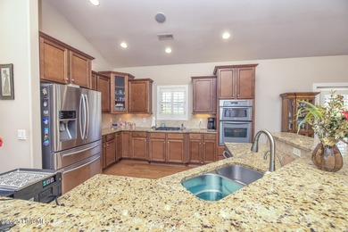 Welcome to effortless, single-level living in the highly on Cape Fear National At Brunswick Forest in North Carolina - for sale on GolfHomes.com, golf home, golf lot