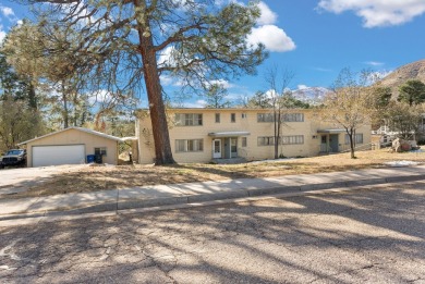 Come snuggle up in this cozy, single level, 3 bedroom 2 bath on Los Alamos County Golf Course in New Mexico - for sale on GolfHomes.com, golf home, golf lot