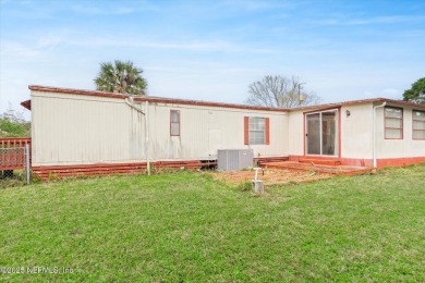 Welcome to this charming 2-bedroom, 1-bath home on Anastasia on Marsh Creek Country Club in Florida - for sale on GolfHomes.com, golf home, golf lot