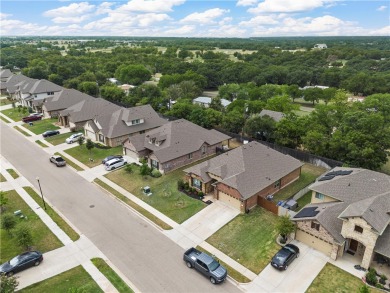 Welcome to this move-in ready 3-bedroom, 2.5-bathroom brick home on Twin Rivers Golf Club in Texas - for sale on GolfHomes.com, golf home, golf lot