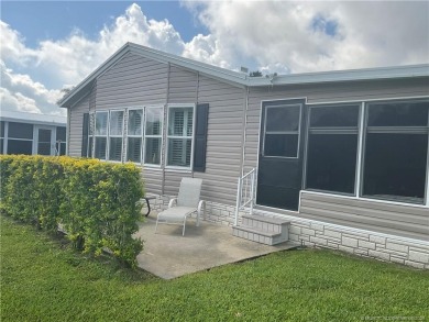 Beautiful home w/6 dbl paned windows overlooking the 10th tee & on Indianwood Golf and Country Club in Florida - for sale on GolfHomes.com, golf home, golf lot