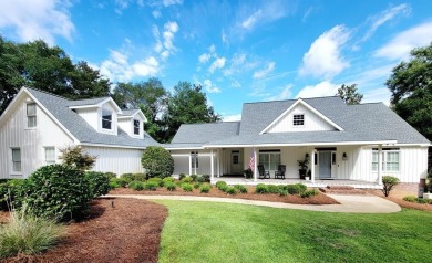 Located in the prestigious Okefenokee Country Club, this on Okefenokee Country Club in Georgia - for sale on GolfHomes.com, golf home, golf lot