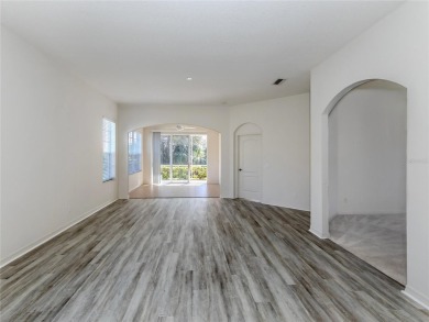 One or more photo(s) has been virtually staged. Step into a on Plantation Golf and Country Club in Florida - for sale on GolfHomes.com, golf home, golf lot