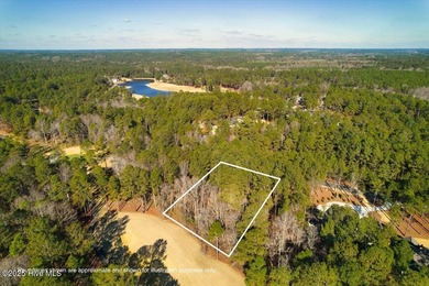 Level golf front home site is gently wooded with lovely tree on Forest Creek Golf Club  in North Carolina - for sale on GolfHomes.com, golf home, golf lot