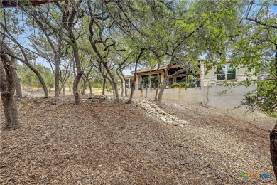 WOW factor defined! This breathtaking one story home, loaded on Highland Lakes Golf Course in Texas - for sale on GolfHomes.com, golf home, golf lot