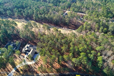 Level golf front home site is gently wooded with lovely tree on Forest Creek Golf Club  in North Carolina - for sale on GolfHomes.com, golf home, golf lot