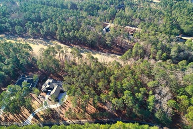 Level golf front home site is gently wooded with lovely tree on Forest Creek Golf Club  in North Carolina - for sale on GolfHomes.com, golf home, golf lot