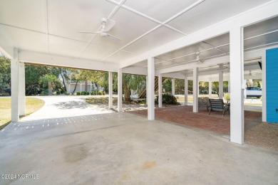 Welcome home to this ocean side cottage in the desirable Ocean on The Country Club of the Crystal Coast in North Carolina - for sale on GolfHomes.com, golf home, golf lot