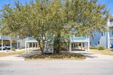 Welcome home to this ocean side cottage in the desirable Ocean on The Country Club of the Crystal Coast in North Carolina - for sale on GolfHomes.com, golf home, golf lot