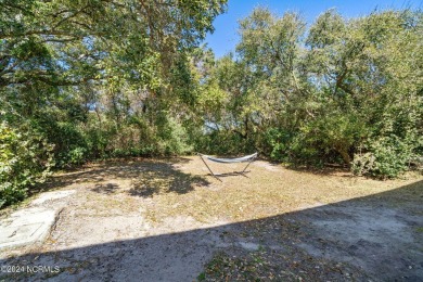 Welcome home to this ocean side cottage in the desirable Ocean on The Country Club of the Crystal Coast in North Carolina - for sale on GolfHomes.com, golf home, golf lot