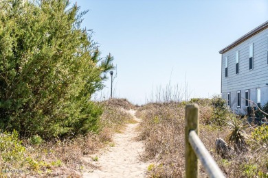 Welcome home to this ocean side cottage in the desirable Ocean on The Country Club of the Crystal Coast in North Carolina - for sale on GolfHomes.com, golf home, golf lot