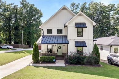 Welcome to this meticulously crafted modern farmhouse, crafted on East Lake Golf Club in Georgia - for sale on GolfHomes.com, golf home, golf lot