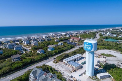 Welcome home to this ocean side cottage in the desirable Ocean on The Country Club of the Crystal Coast in North Carolina - for sale on GolfHomes.com, golf home, golf lot