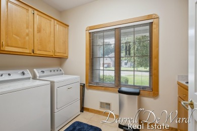 Prepare to live the life you've pictured, perfectly positioned on Railside Golf Club in Michigan - for sale on GolfHomes.com, golf home, golf lot