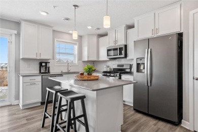 Step into modern elegance with this exceptional 2-story townhome on Chaska Town Course in Minnesota - for sale on GolfHomes.com, golf home, golf lot