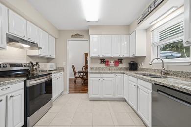 Welcome to your dream home, tucked away on a quiet street in the on Golf Club at Bluewater Bay Resort in Florida - for sale on GolfHomes.com, golf home, golf lot