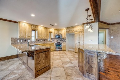 Stunning Lakefront property in the private, gated community of on Lake Kiowa Golf Course in Texas - for sale on GolfHomes.com, golf home, golf lot