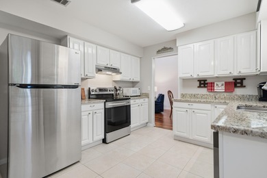 Welcome to your dream home, tucked away on a quiet street in the on Golf Club at Bluewater Bay Resort in Florida - for sale on GolfHomes.com, golf home, golf lot