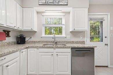 Welcome to your dream home, tucked away on a quiet street in the on Golf Club at Bluewater Bay Resort in Florida - for sale on GolfHomes.com, golf home, golf lot