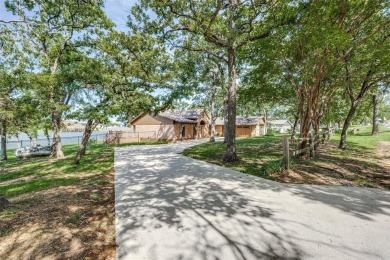 Stunning Lakefront property in the private, gated community of on Lake Kiowa Golf Course in Texas - for sale on GolfHomes.com, golf home, golf lot