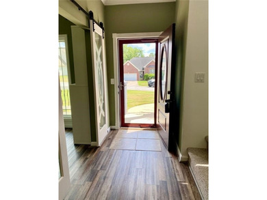 Welcome to 2156 Racoon Court, located in Mirror Lake, a 36 holes on Mirror Lake Golf Club in Georgia - for sale on GolfHomes.com, golf home, golf lot