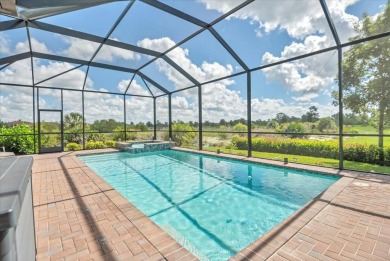 Fantastic views surround this impeccably maintained Golf Village on Sarasota National Golf Club in Florida - for sale on GolfHomes.com, golf home, golf lot