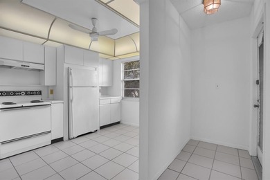 Corner residence offering stunning water views from every window on Wynmoor Golf Course in Florida - for sale on GolfHomes.com, golf home, golf lot