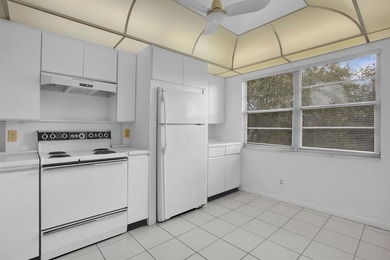 Corner residence offering stunning water views from every window on Wynmoor Golf Course in Florida - for sale on GolfHomes.com, golf home, golf lot