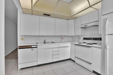 Corner residence offering stunning water views from every window on Wynmoor Golf Course in Florida - for sale on GolfHomes.com, golf home, golf lot