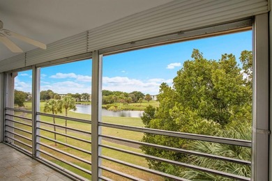 Corner residence offering stunning water views from every window on Wynmoor Golf Course in Florida - for sale on GolfHomes.com, golf home, golf lot