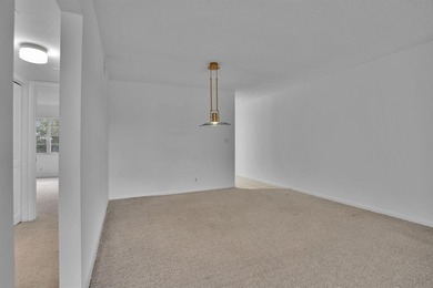 Corner residence offering stunning water views from every window on Wynmoor Golf Course in Florida - for sale on GolfHomes.com, golf home, golf lot