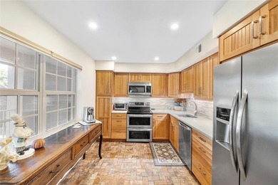 DECORATOR COMPLETELY REMODELED THREE BEDROOM SPLIT PLAN, TWO on Oaks Country Club in Florida - for sale on GolfHomes.com, golf home, golf lot