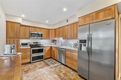 DECORATOR COMPLETELY REMODELED THREE BEDROOM SPLIT PLAN, TWO on Oaks Country Club in Florida - for sale on GolfHomes.com, golf home, golf lot