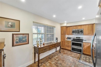 DECORATOR COMPLETELY REMODELED THREE BEDROOM SPLIT PLAN, TWO on Oaks Country Club in Florida - for sale on GolfHomes.com, golf home, golf lot