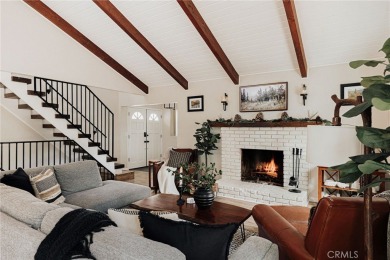 Escape to this stunning 4-bedroom, 3-bathroom mountain cabin on Lake Arrowhead Country Club in California - for sale on GolfHomes.com, golf home, golf lot
