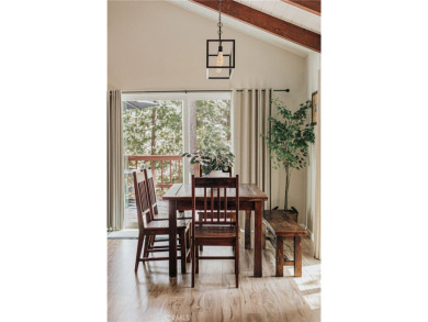 Escape to this stunning 4-bedroom, 3-bathroom mountain cabin on Lake Arrowhead Country Club in California - for sale on GolfHomes.com, golf home, golf lot