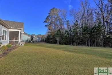 Welcome to a home that fulfills every dream and exceeds every on Savannah Quarters Country Club in Georgia - for sale on GolfHomes.com, golf home, golf lot