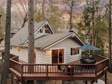 Escape to this stunning 4-bedroom, 3-bathroom mountain cabin on Lake Arrowhead Country Club in California - for sale on GolfHomes.com, golf home, golf lot