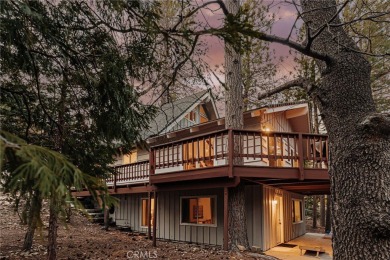 Escape to this stunning 4-bedroom, 3-bathroom mountain cabin on Lake Arrowhead Country Club in California - for sale on GolfHomes.com, golf home, golf lot