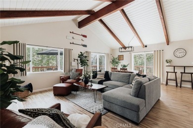 Escape to this stunning 4-bedroom, 3-bathroom mountain cabin on Lake Arrowhead Country Club in California - for sale on GolfHomes.com, golf home, golf lot
