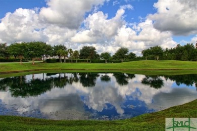 Welcome to a home that fulfills every dream and exceeds every on Savannah Quarters Country Club in Georgia - for sale on GolfHomes.com, golf home, golf lot