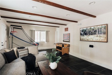 Escape to this stunning 4-bedroom, 3-bathroom mountain cabin on Lake Arrowhead Country Club in California - for sale on GolfHomes.com, golf home, golf lot